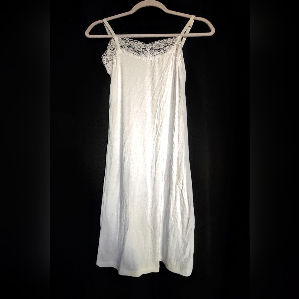 never worn lace dress slip or night gown, very light weight